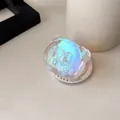 Close-up of a 3D holographic panda phone grip with a laser iridescent finish on a white base - Magnetic Type Stand / Panda Head Iridescent