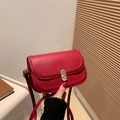Classic red leather crossbody bag with elegant gold metal buckle in a stylish square shape - Red