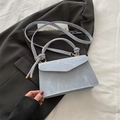 Sac bandoulière minimaliste bleu clair à texture marbrée pour femme avec poignée - L Bleu