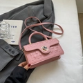 Pink quilted leather handbag with chic flower lock design and adjustable shoulder strap - Pink