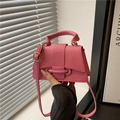 Pink lychee texture mini crossbody bag with top handle and metal buckle closure - Rose Pink