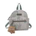 Mini white backpack with green bamboo prints and a brown plush monster keychain charm - With Pendant / Green