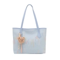 Light blue tote bag with colorful wave embroidery and brown plush bear keychain - Blue