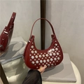 Chic dark red rivet bucket bag with silver studs and polished leather finish - Red