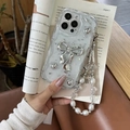 Custodia iPhone glitterata con fiocco metallico, perline d'argento e cinturino lungo - Guscio Crema-Foglia Argento-Fiocco Perle-Catena Perle Romboidali / iPhone 7/8/SE 2020
