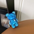 Detailed macro view of a blue translucent bear-shaped phone grip with resin texture - Water Ripple Bear (Translucent Royal Blue)