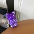 Macro detail of a stylish purple translucent gummy bear phone grip for smartphones. - Water Ripple Bear (Translucent Dark Purple)