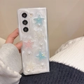 Detail of Galaxy Z Fold pearl case featuring 3D starfish and faux pearl embellishments - Matte Hard Case - White Flash Pearlescent Starfish / Samsung ZFlip3
