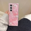 Detailed view of pink phone case featuring 3D resin butterflies and floral rose elements - Compatible with Samsung Z Flip 3 / Resin Rose Polka Dot Butterfly - Pink Glitter