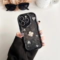 Detail of black wavy phone case with glitter finish, white camellia and rhinestones - Four-leaf Pearl Flower - Black / iPhone 7/8/SE 2020