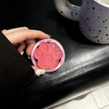 Close-up of pink translucent cat paw phone grip with Good Luck text on black background - Blue Light Matte Magnetic Cat Claw / Dazzling Rose Pink