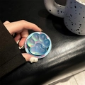 Close-up of translucent blue aurora cat paw phone grip with Good Luck text - Blue Light Matte Magnetic Cat Claw / Dazzling Light Blue