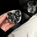 Macro detail of luxury heart-shaped phone grip with black and white rhinestones - Large Rhinestone Heart / Gray