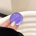 Macro detail of purple holographic glitter and foil texture on the round phone grip - Dark Purple