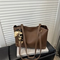 Detail of brown faux leather tote bag with white contrast stitching and silk scarf - Dark Brown