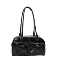 Glossy black Boston bag with double bow pockets and long handles for shoulder wear - Black