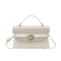 Elegante tweekleurige Kelly tas met geweven flap en gouden metalen details - Wit