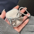 Funda transparente para AirPods con lazo de metal plateado líquido y mosquetón de plata - Lazo grande con purpurina (Transparente) / AirPods 1.ª/2.ª generación
