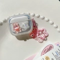 Details der AirPods-Hülle mit rosa Bär, Glitzersternen und blumigem Anhänger-Zubehör - Stern Rosa Hase / AirPods 1/2. Generation