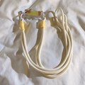 Detail of a thick cream braided phone strap with a cute cartoon puppy acrylic clip - No. 24 Yellow Gift Box Dog - Braided Rope