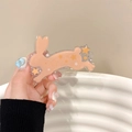Dettaglio clip per telefono a forma di coniglio rosa con cordino intrecciato regolabile - (Clip Posteriore) Coniglio che Corre - Marrone