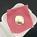 Detailed view of irregular golden metal accessory with happy script engraving - Happy Geometric Matte Gold