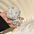 Detail der glitzernden Fischschwanz AirPods Hülle mit Perlen und Sternanhänger Zubehör - Meerjungfrau-Schwanz-Stil mit Stern-Anhänger / AirPods 1/2. Generation