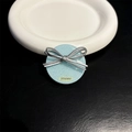 Detail of glitter light blue phone grip featuring silver bow and 'yousee' text detail - Standard Style - Blue