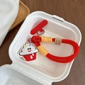 Detailed view of the cute red braided mobile phone lanyard featuring a plush cupcake charm - Ice Cream Style / Red Braided Rope
