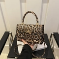 Bolso bandolera con estampado de leopardo, broche de lazo dorado y asa redonda 2025 - Caqui