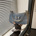 Blue denim underarm bag with silver butterfly buckle and white pearl chain decoration - Dark Blue