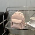 Mini pink velvet backpack for women with front zipper pocket and stylish embroidery - Pink With Pendant