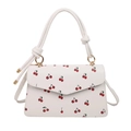 Chic white crossbody bag with cute cherry patterns and gold hardware detail - White