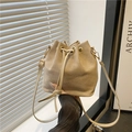 Minimalist beige drawstring bucket bag with adjustable shoulder strap and gold hardware - Khaki