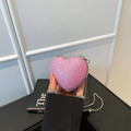 Pink glitter heart-shaped crossbody bag with silver chain strap and metallic frame - Rose Red