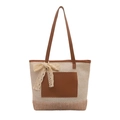 Stroh-Eimertasche mit braunen Lederdetails und Spitzenschleife für sommerliche Mode - Khaki
