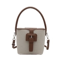 Vintage canvas bucket bag in beige and brown leather with a buckle strap and top handle - Brown