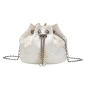 Ivory bucket bag with butterfly embroidery, pearl drawstring, and silver chain strap - White