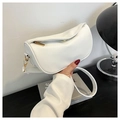 Detail view of the white lychee grain texture and gold metal hardware on the half-moon bag - White