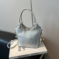 Metallic silver bucket tote bag with gold hardware and a detachable shoulder strap - No Pendant / Silver