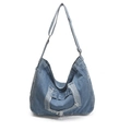 Vintage blue denim crossbody bag with distressed fringe details and adjustable strap - Light Blue
