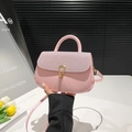 Pink faux leather shoulder bag with rhinestone flap and gold horseshoe buckle closure - Pink