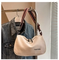 Detail of a cream canvas crossbody bag with striped webbing strap and FANYISSA logo - White