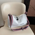White canvas dumpling bag with striped wide strap and FANYISSA print on the side - White