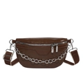 Deep brown leather saddle bag with silver chain and wide canvas strap on white background - Brown