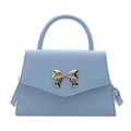 Elegant light blue square handbag with a golden metal bow and adjustable shoulder strap - Blue