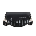 Fashionable black music-themed crossbody bag with piano keys and G clef print design - Black
