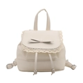 Schicker Mini-Rucksack in Creme mit Spitzenbesatz und feiner Schleife in der Mitte - Weiß