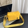 Minimalist bright yellow lightweight nylon crossbody bag with wide shoulder strap - Yellow