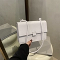 White faux crocodile leather rectangular flap bag with silver square lock and slim strap - White
